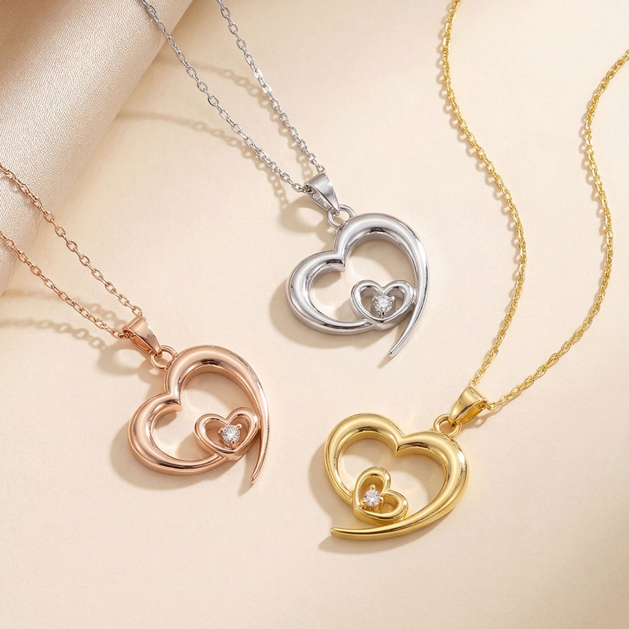 Double Heart Necklace with Diamond in silver, gold and rose gold
