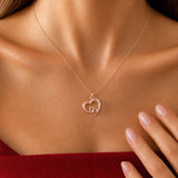 Double Heart Necklace with Diamond in rose gold, worn