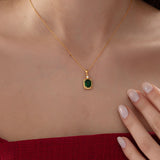 Emerald Cut Emerald Necklace with Diamond in gold, worn