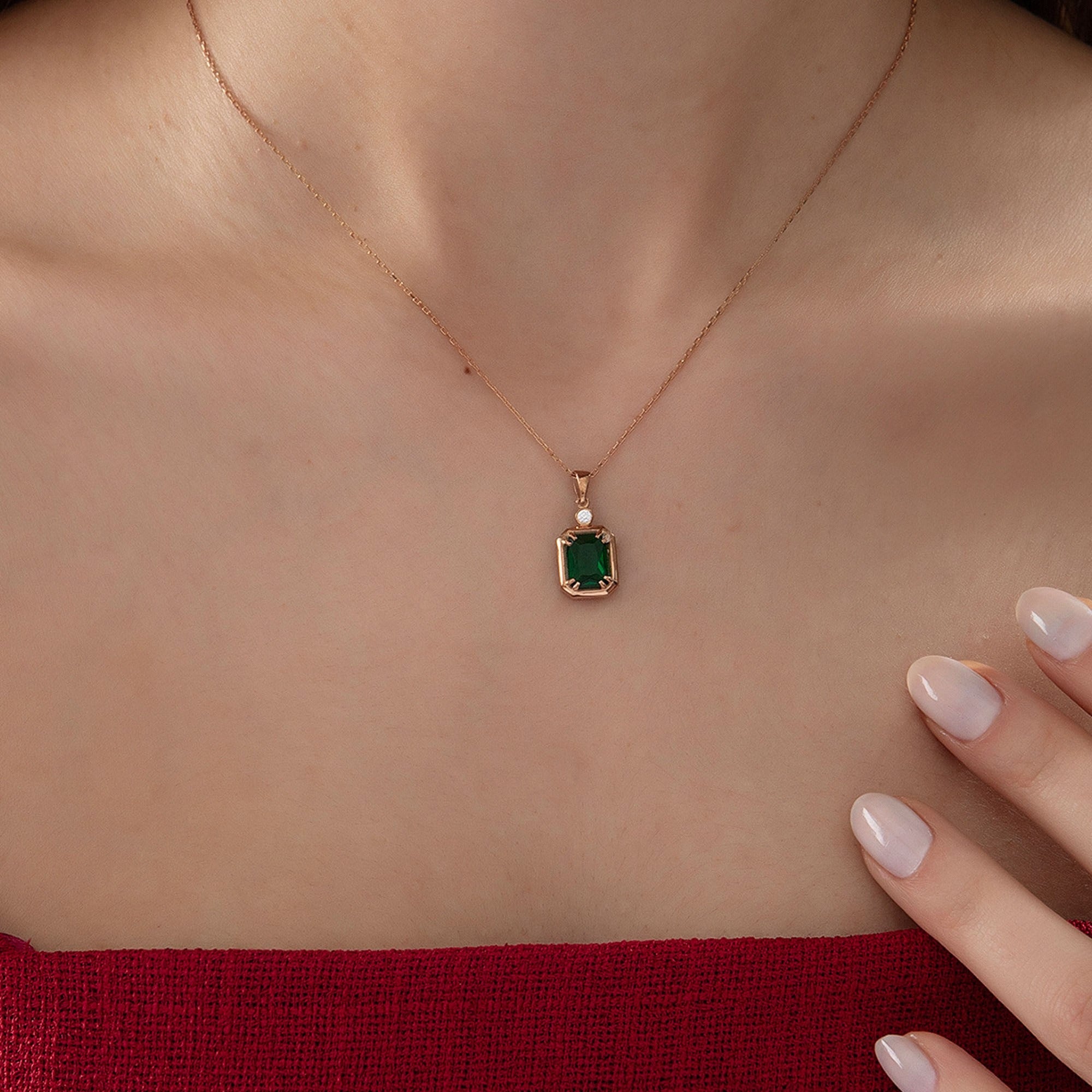 Emerald Cut Emerald Necklace with Diamond in rose gold, worn