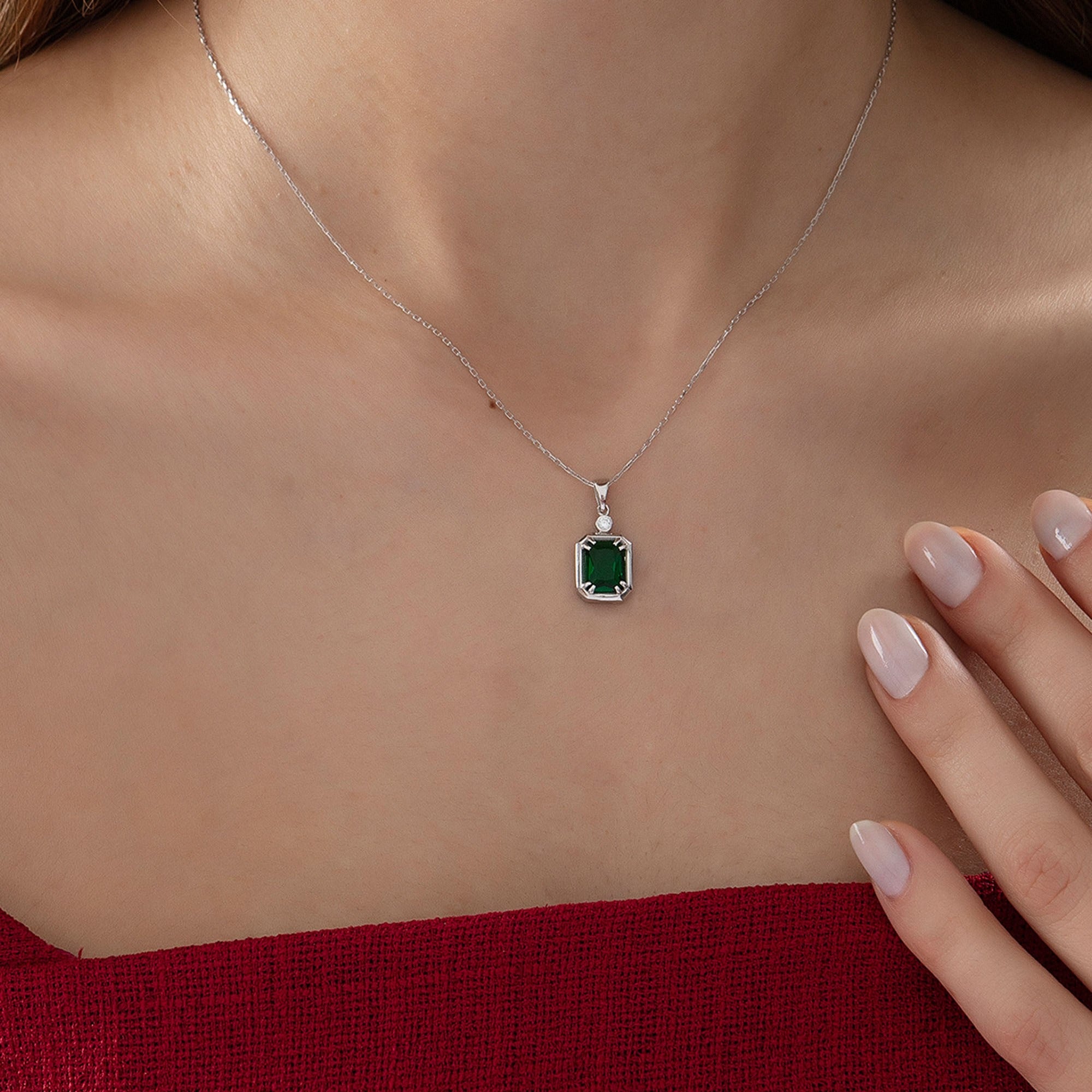 Emerald Cut Emerald Necklace with Diamond in silver, worn