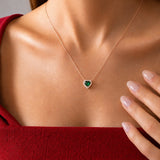 Heart Emerald Halo Necklace in rose gold, worn