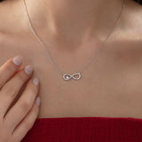 Infinity Necklace with Diamond in silver, worn