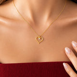 Open Heart Necklace with Diamond in gold, worn