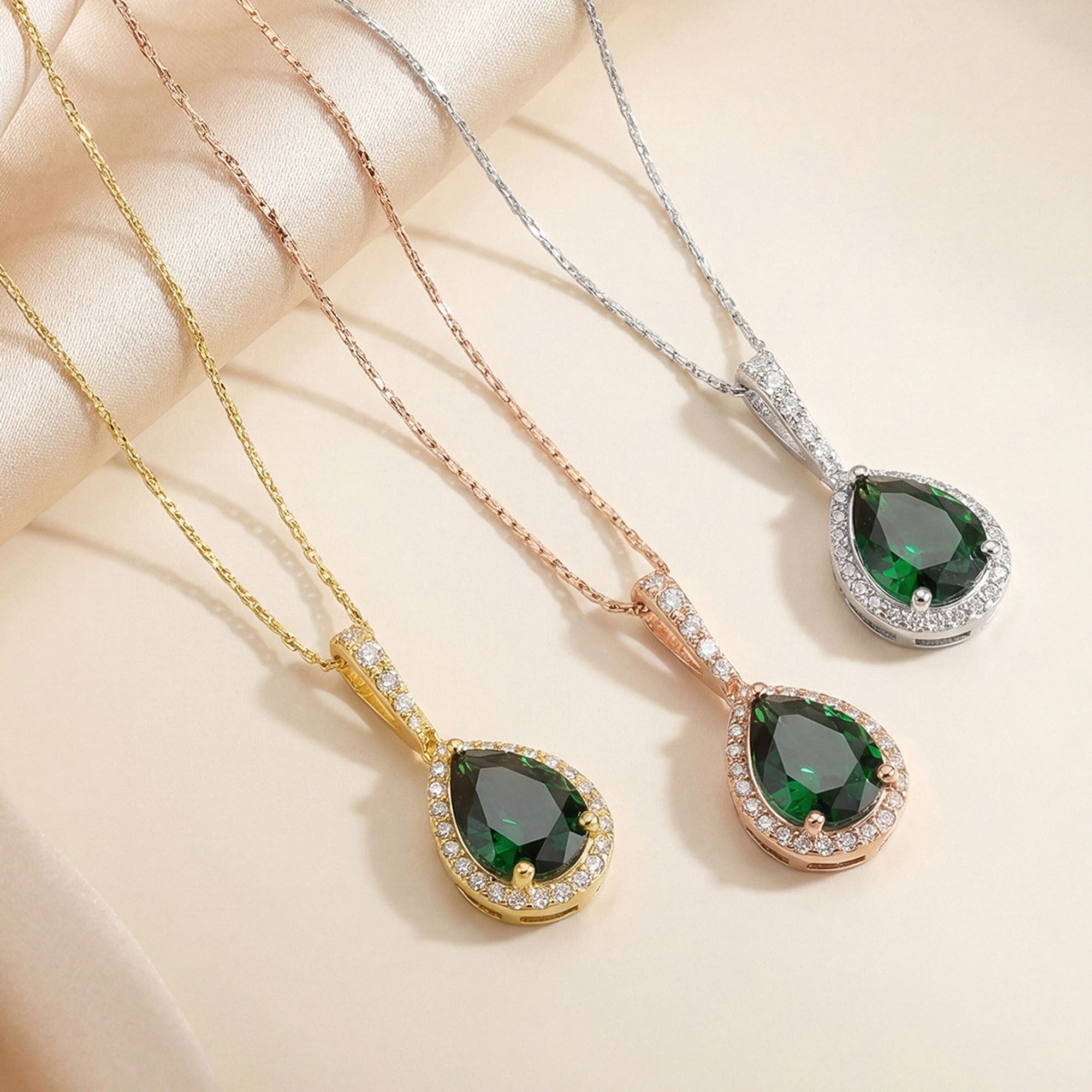 Pear Emerald Halo Necklace in silver, gold and rose gold
