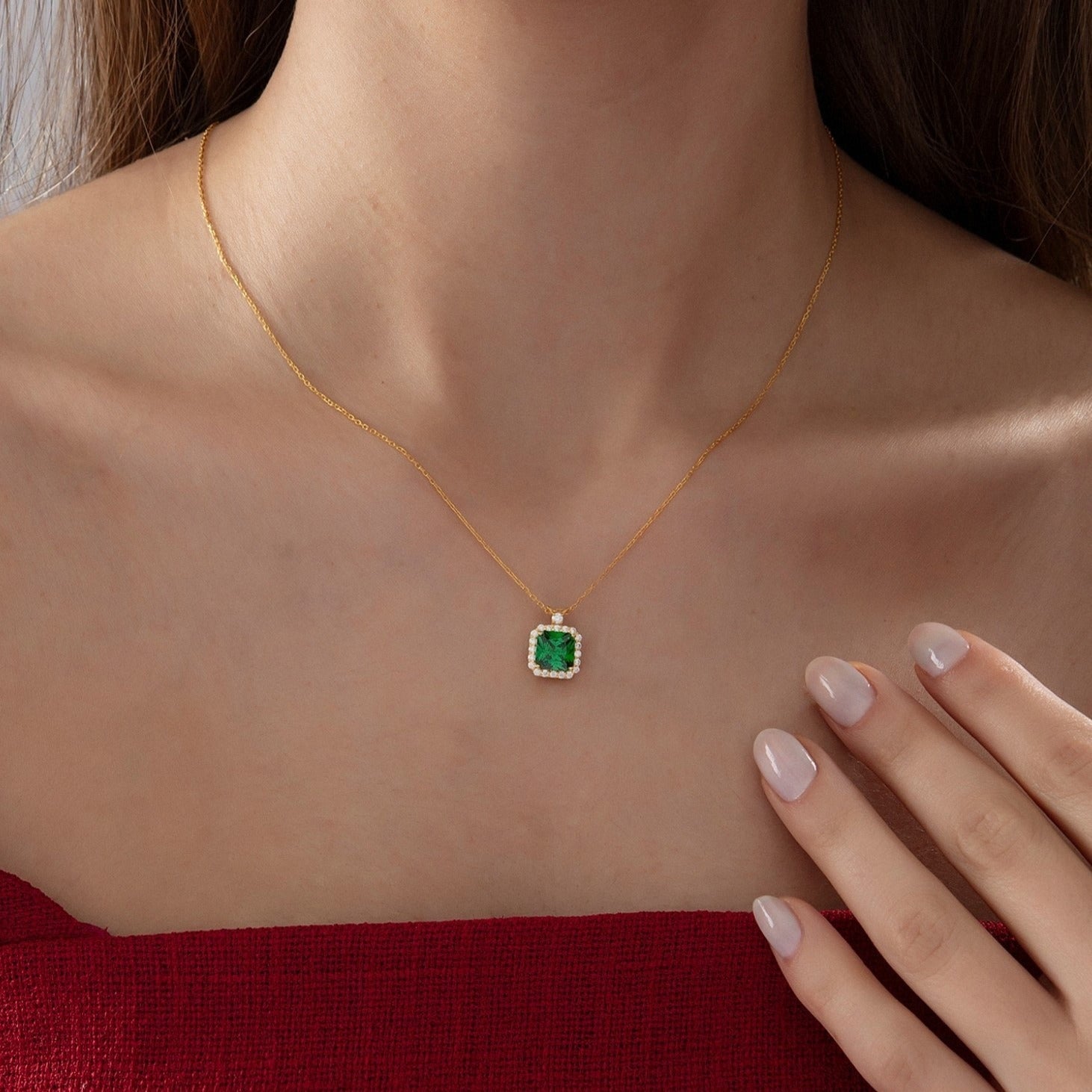 Princess Cut Emerald Halo Necklace in gold, worn