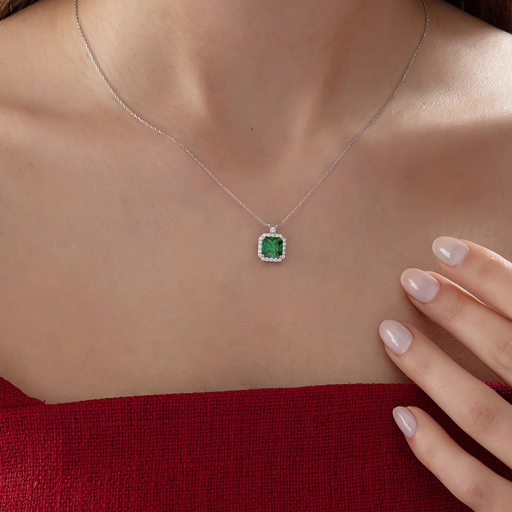 Princess Cut Emerald Halo Necklace in silver, worn